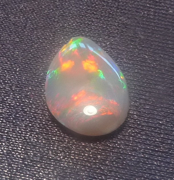 Australian Opal - Carbon causing dark grey background